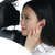 Remax/睿量RB-T22迷你蓝牙耳机简约商务无线耳塞单耳4.2版本按键控制一拖二男女情侣款手机清晰通话音乐约3小时(红色)第3张高清大图