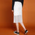 七格格2017春装新款 运动风撞色侧条装饰系带中长款半身裙女X1028(白色 XL)第4张高清大图