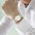 天梭(TISSOT)手表心意系列时尚休闲钢带日历防水石英男士腕表 T52.2.481.31(白色 钢带)第5张高清大图