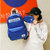 didas/阿迪达斯女包双肩包男包书包校园户外旅行包休闲运动韩版背包(蓝色)第5张高清大图