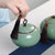 龙泉青瓷大码储存罐手工陶瓷茶具便携普洱茶密封罐大号茶叶罐(迷你茶叶罐粉青)第2张高清大图