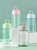 卡西诺塑料水杯女夏天儿童小学生简约防摔便携带盖运动水壶茶杯子(莫兰迪绿色1000ML【有茶隔-密封防漏】)第4张高清大图