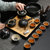 茶杯套装家用简约现代客厅办公室整套黑陶瓷茶壶茶碗日式功夫茶具(螺纹壶配乌金石茶盘(10头茶具))第4张高清大图