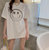 短袖T恤女2021夏季韩版新款中长款宽松笑脸圆领女装上衣(黑色 L)第2张高清大图