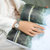 天梭(TISSOT)瑞士手表 天梭女表魅时系列小美人钢带石英女士时尚简约手表(T109.210.11.033.00)第6张高清大图