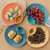 创意日式贝壳吐骨碟多用零食盘小吃点心盘餐桌水果盘家用塑料盘子(贝壳盘4个装（亚丁绿）)第3张高清大图