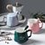 杯子陶瓷马克杯带盖勺家用喝水杯女大容量办公室咖啡杯情侣款一对(墨绿色-420ml（带盖勺）)第5张高清大图