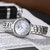 天梭(TISSOT) 瑞士手表 弗拉明戈系列钢带石英女士手表 时尚潮流圆形钢带女表(T094.210.11.111.00)第6张高清大图