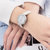 天梭(TISSOT)瑞士手表新款 弗拉明戈系列石英表女表 珍珠贝母表盘优雅时尚腕表(T094.210.16.011.00)第5张高清大图
