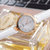天梭(TISSOT)瑞士手表新款 弗拉明戈系列石英表女表 珍珠贝母表盘优雅时尚腕表(T094.210.26.111.01)第3张高清大图