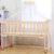 HUGBB婴儿床宝宝加大童床环保实木无油漆可侧翻与大人床合并、可变书桌、可变摇床(实木床+五件套+棕垫+赠品 版本)第5张高清大图