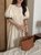 韩版气质纯色圆领宽松系带显瘦开叉拼色泡泡袖连衣裙(杏色 均码)第2张高清大图